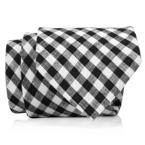 Black and white gingham tie on white background.