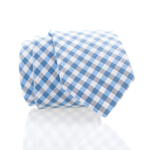 A blue and white gingham tie on a white background.